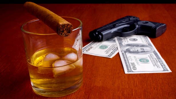 gun_smoking_money_shutterstock_93311092-615x345.jpg