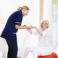 ;ady being helped by her carer