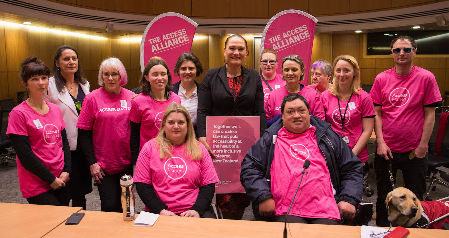 A photo of the Hon Carmel Sepuloni,
MP's Poto Williams and Chloe Swarbrick with Access Matters campaigners - photo credit Victor Komarovsky