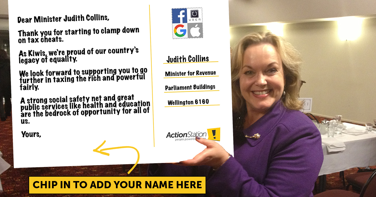 Judith Collins holding a giant card that says \