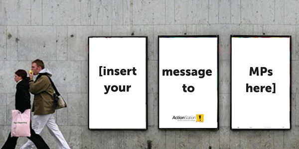 street posters that say: insert your message to MPs here