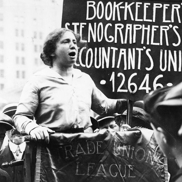 ...the worker must have bread, but she must have roses, too