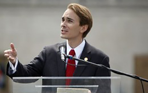 Brent giving a speech