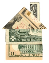 Money in the shape of a house