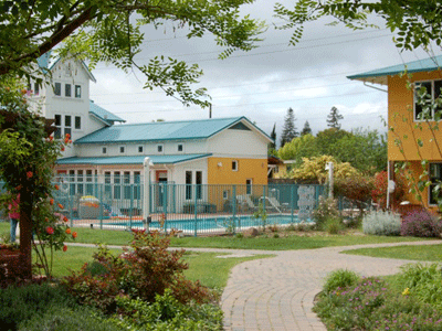 Pleasant Hill Cohousing - view of Common House and walk to homes