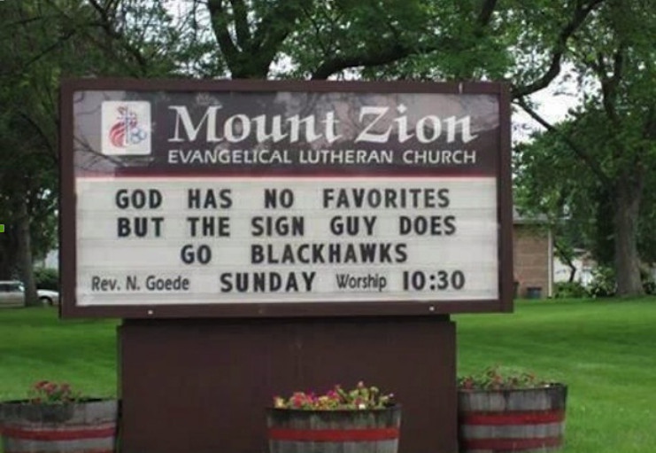 God has no favorites, but the sign guy does - go Blackhawks