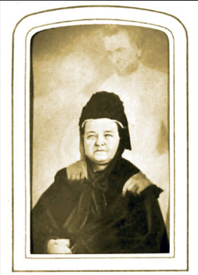 spirit photograph of Mary with faint overlay of Abraham and Thaddeus