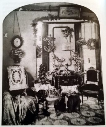 image of parlor filled wtih flowers, needlework, etc.