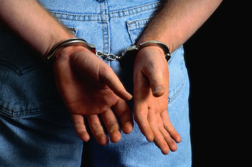 photo of handcuffed individual