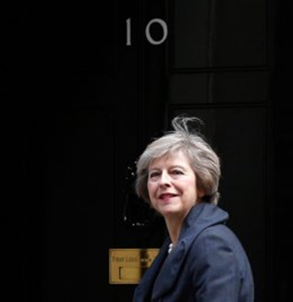 photo of Theresa May at front door of 10 Downing Street