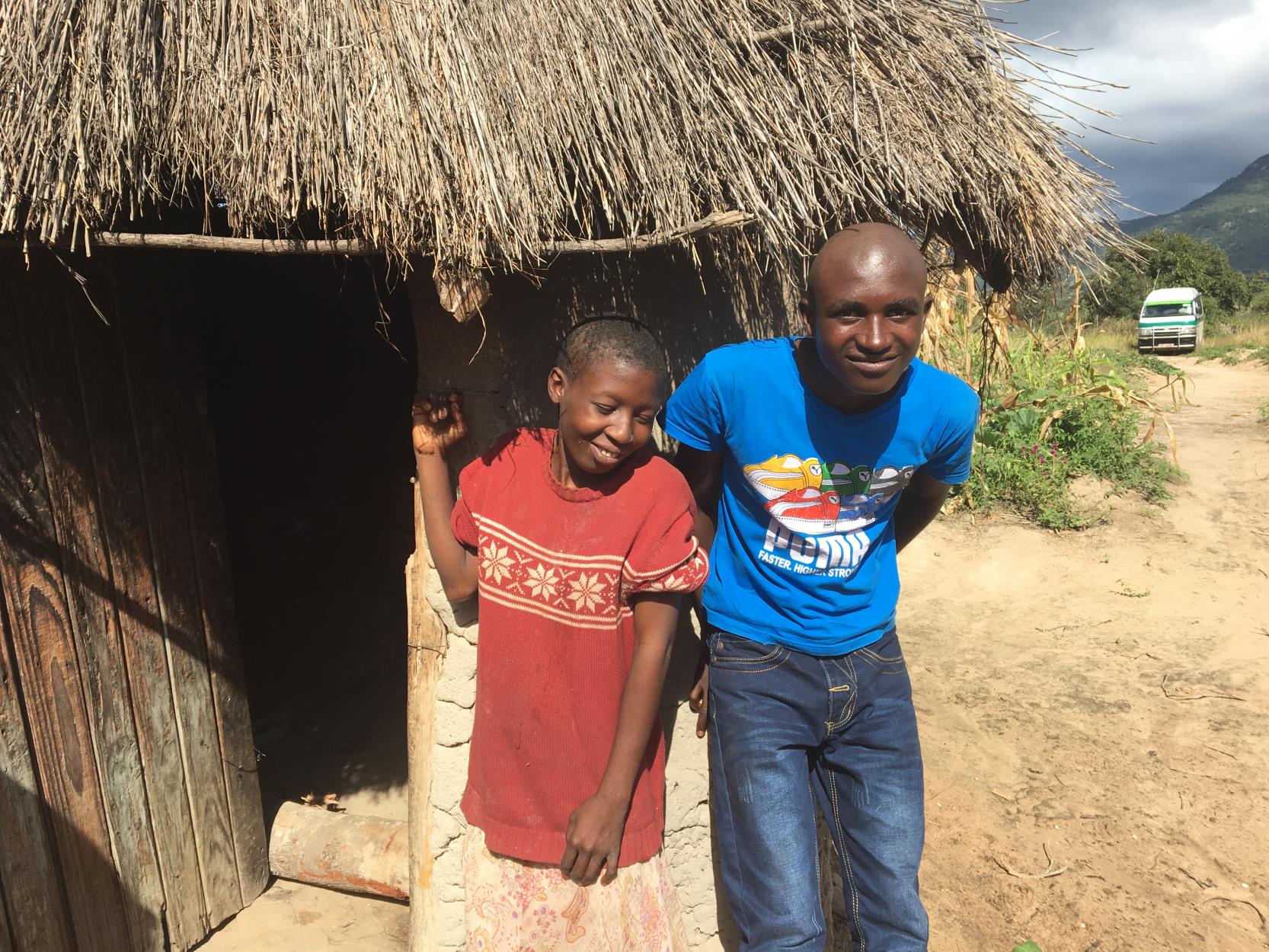 photo of two people at entry
