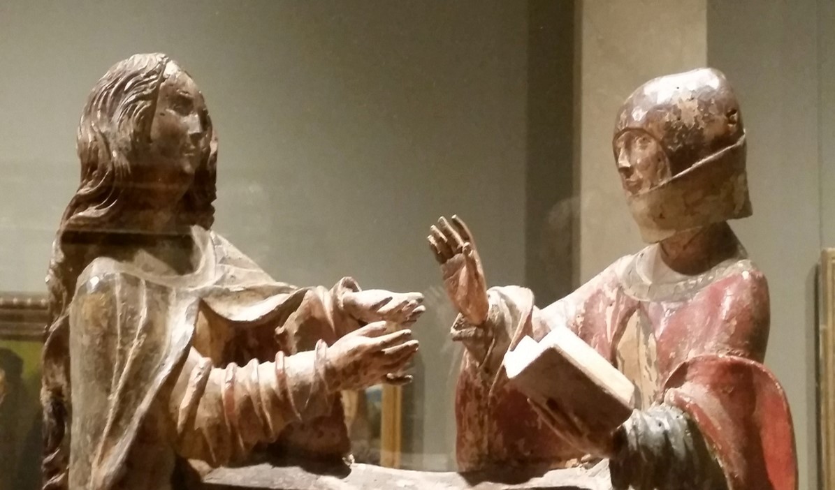 photo of sculpture of two women in conversation