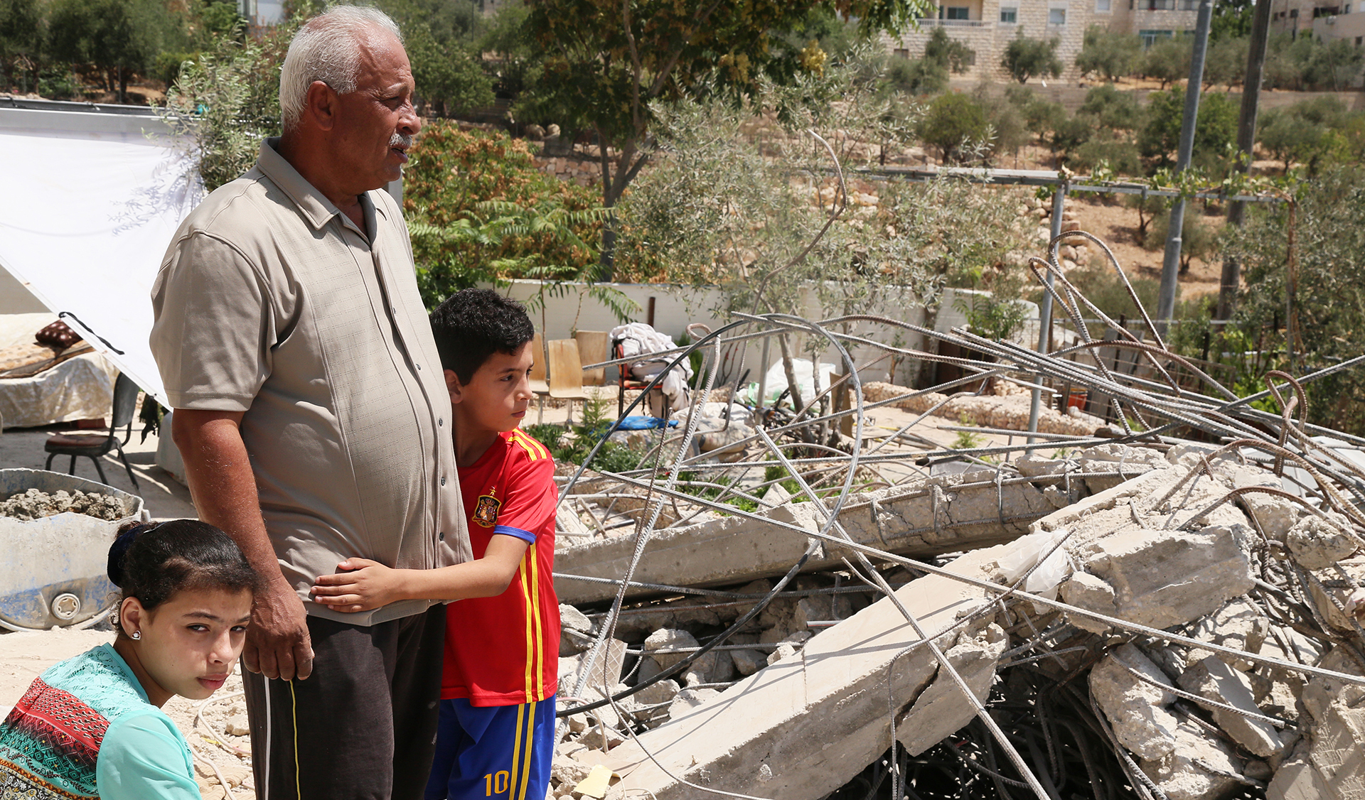 Israeli building laws push father to demolish his children's rooms