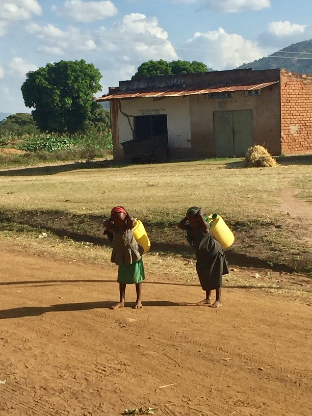 kids_carrying_water-red_size.jpg