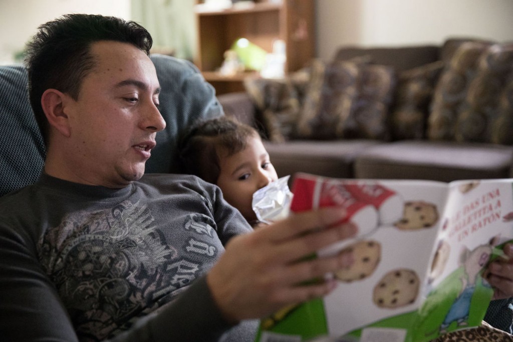 711 - OTOC - OMH - TPS - Wilfredo Rivera Reads to His Daughter