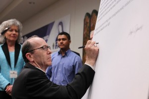 1311 - VIP - Bishop Olmsted Signs Letter to Congress for Immigration Reform - Catholic Sun Catholic Bishop Olmsted signs letter to Congress for Immigration Reform at event organized by Valley Interfaith Project