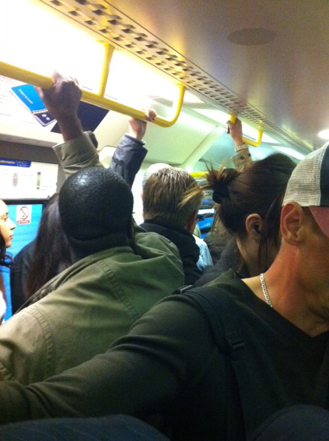 Packed_train_carriage.jpg
