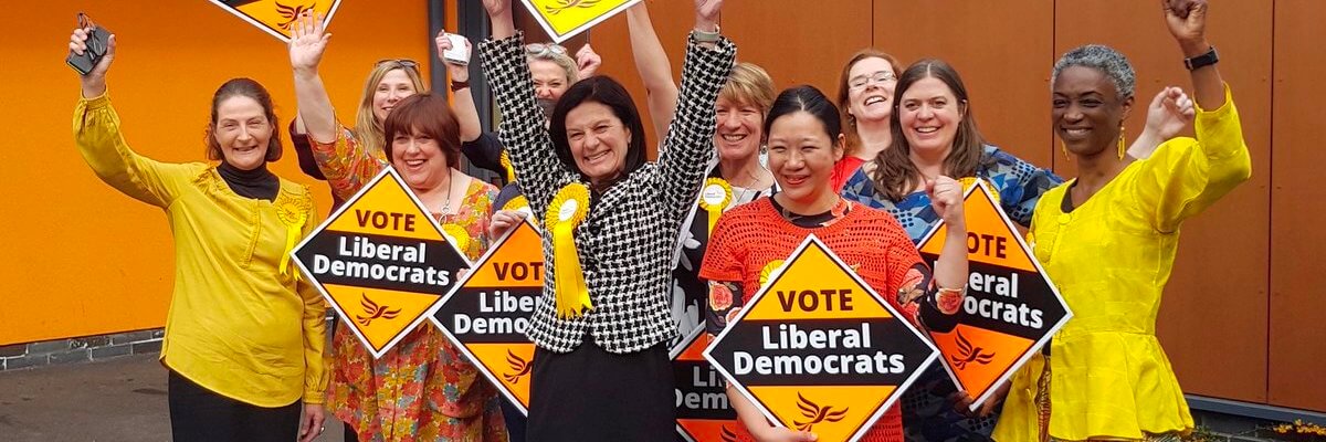 Liberal Democrats celebrating victory in South Cambridgeshire