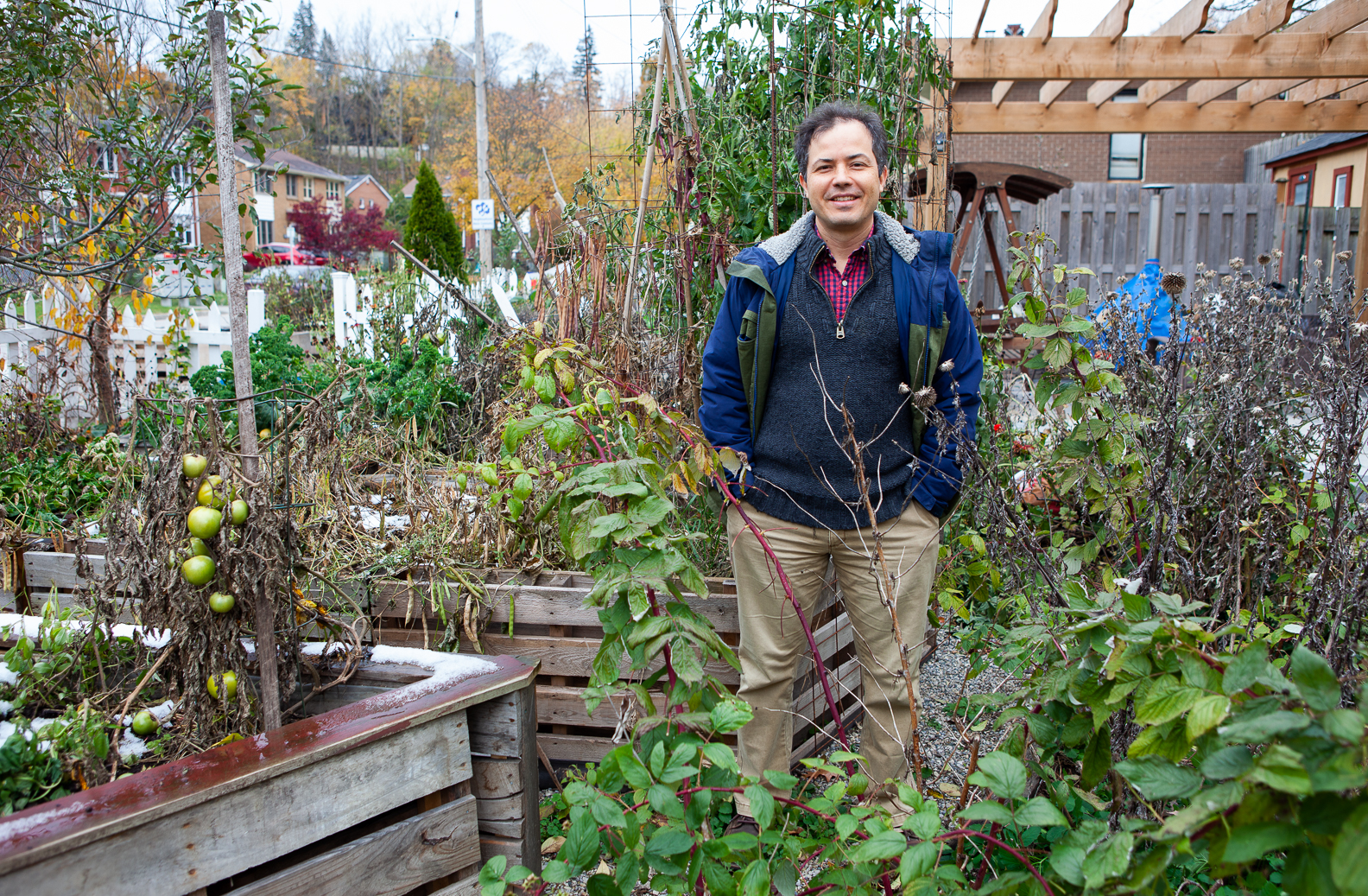 Gabor Sass standing in his home garden
