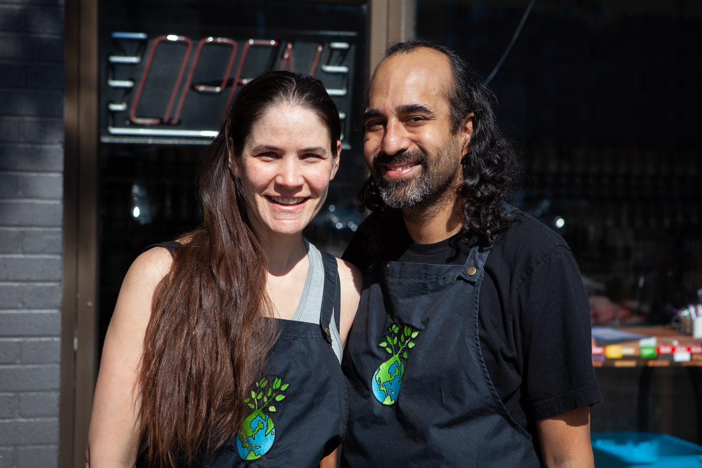 Reimagine Co. co-founders Kara Rijnen and Heenal Rajani standing outside Reimagine Co