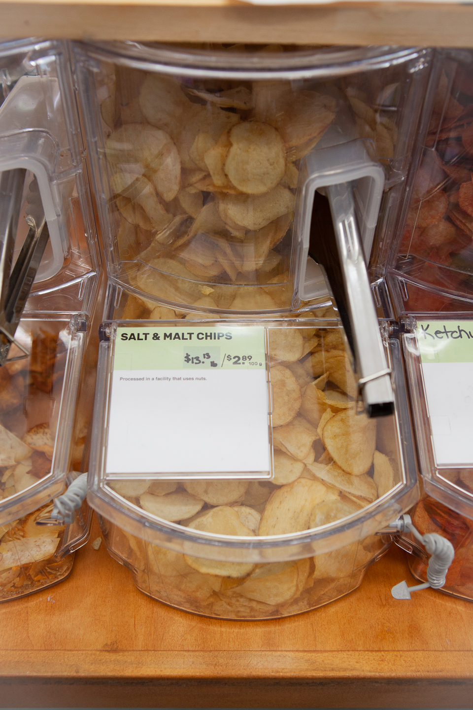Bulk bin of malt potato chips