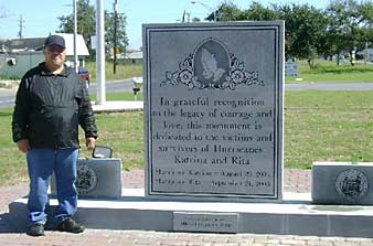 Standing next to a New Orleans memorial to the victims of Katrina