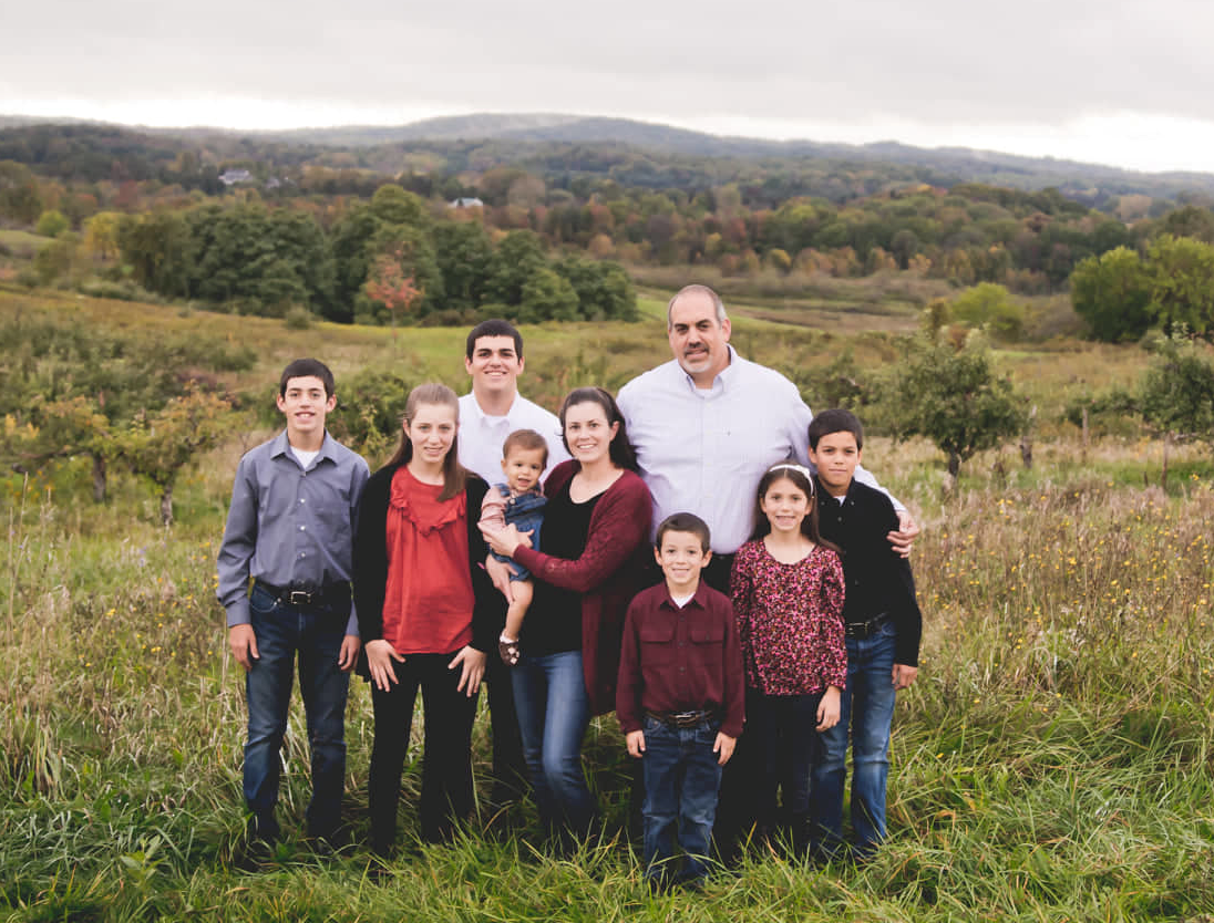 (MOFC’s Aaron Dorr with his wife, Kristen, and their 7 kids.) (MOFC’s Aaron Dorr with his wife, Kristen, and their 7 kids.)