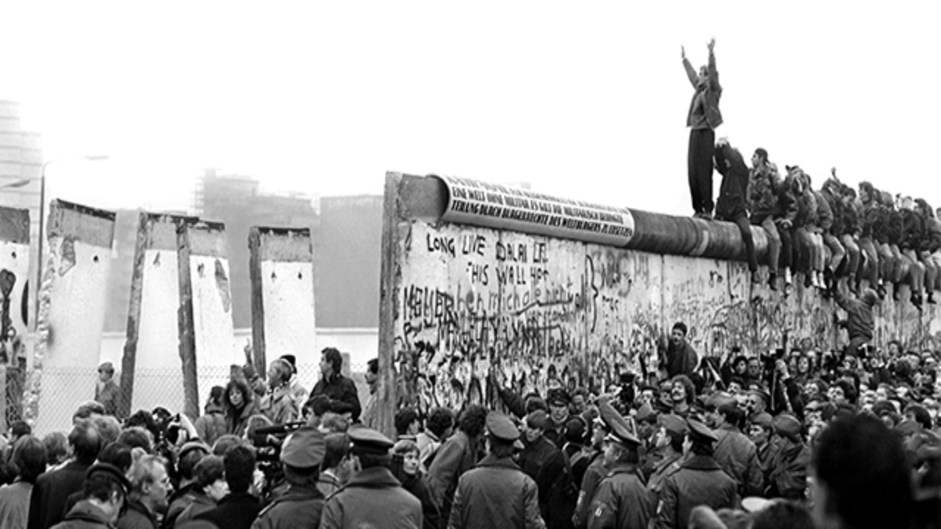 Celebrate the fall of the Berlin Wall by fighting to tear down other