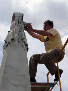 Jason Church taking color measurement on the Macomb monument at Congressional Cemetery in Washington, D.C. Image provided by Jason Church.
