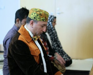 Photograph of seated muslims from Queer and Muslim: Finding Peace Within Islam.