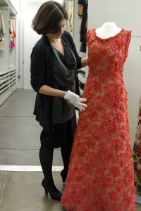 Clare Sauro with an evening dress designed by Givenchy and donated to the DHCC by Princess Grace of Monaco. The entire dress is embroidered with genuine coral branches that make a delightful tinkling sound when moved. Courtesy of the Drexel Historic Costume Collection, Drexel University.