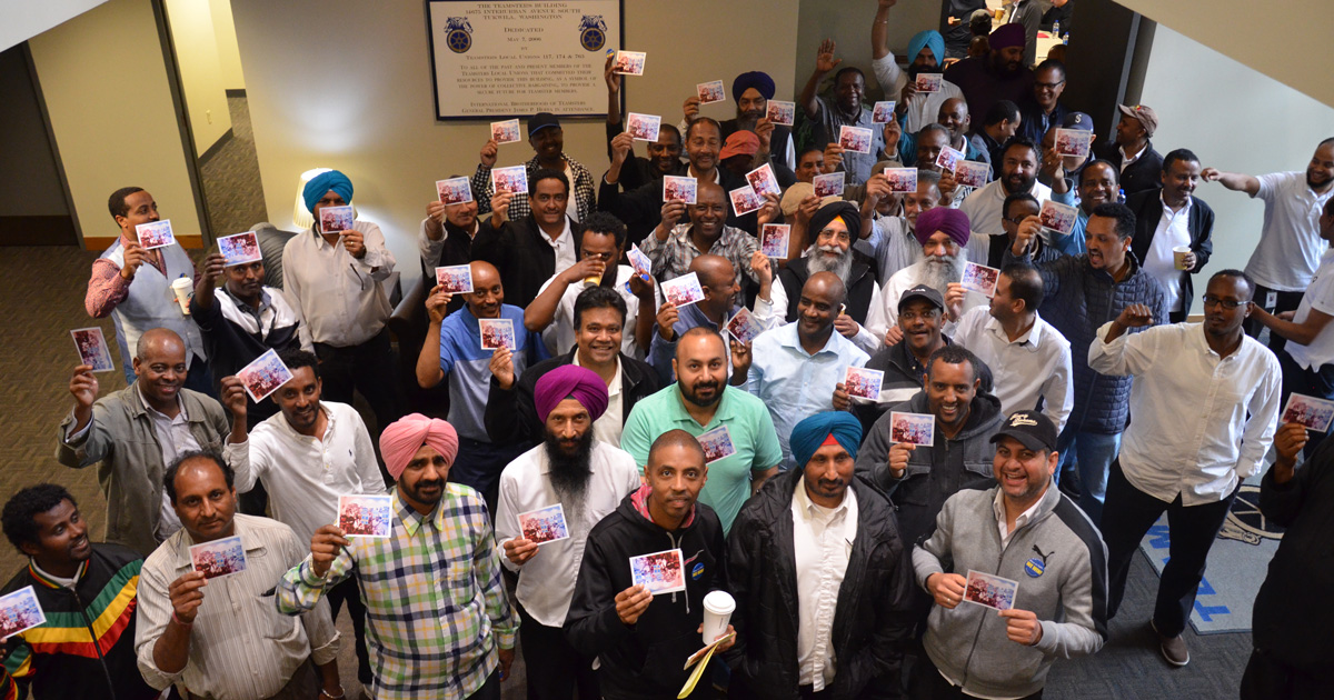 Airport Drivers Celebrate as Contractor Suspends Pay-To-Work Image