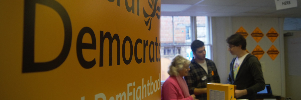 Liberal Democrat activists get a briefing in a by-election HQ