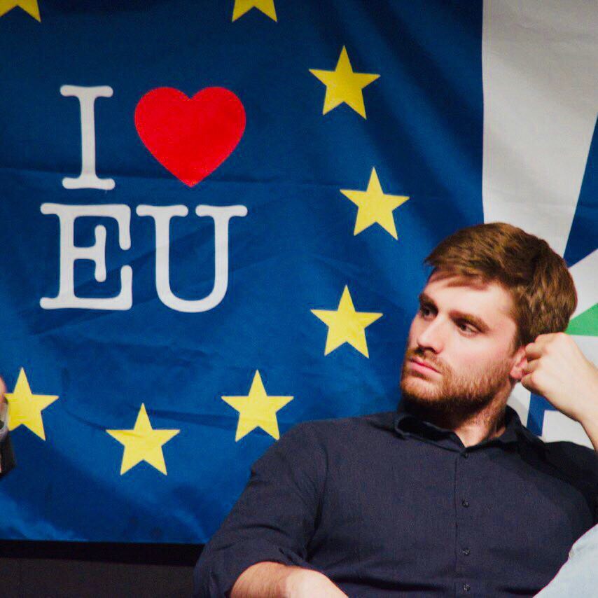 Andrea Venzon in front of the European flag
