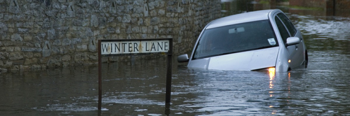 A car stranded in flood waters.