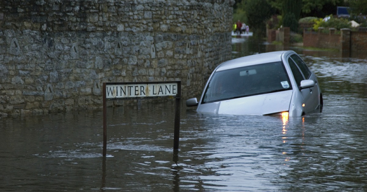 A car stranded in flood waters.