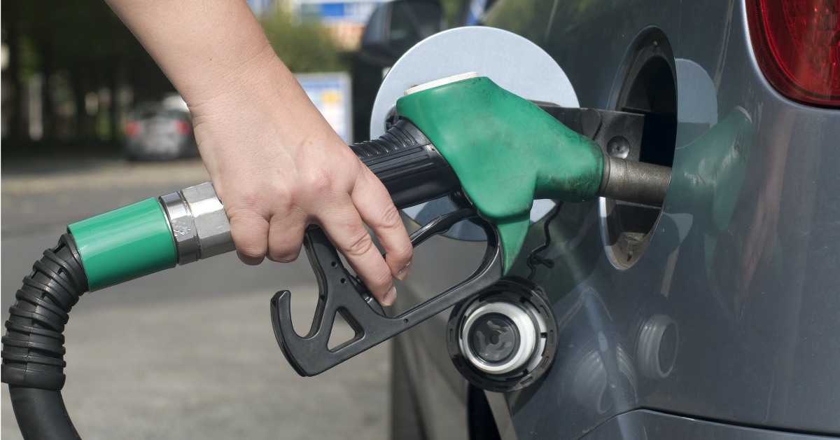 Car being filled with fuel.