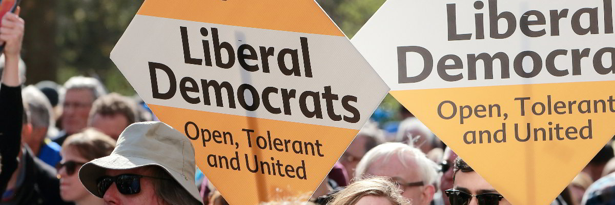 Diamond posters with text 'Liberal Democrats: Open, Tolerant and United