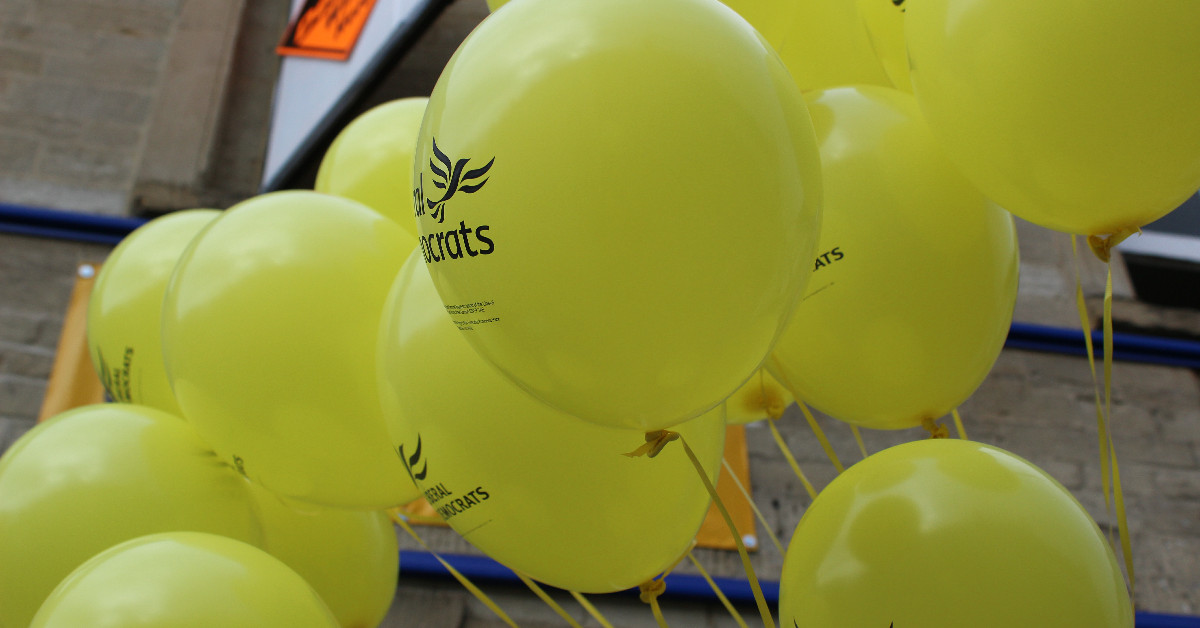 A cluster of Liberal Democrat balloons.