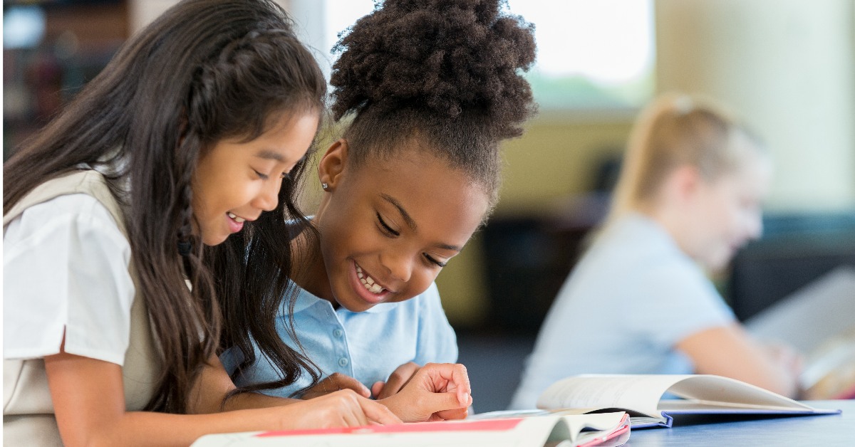 Two girls studying