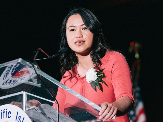 Sheng at the podium
