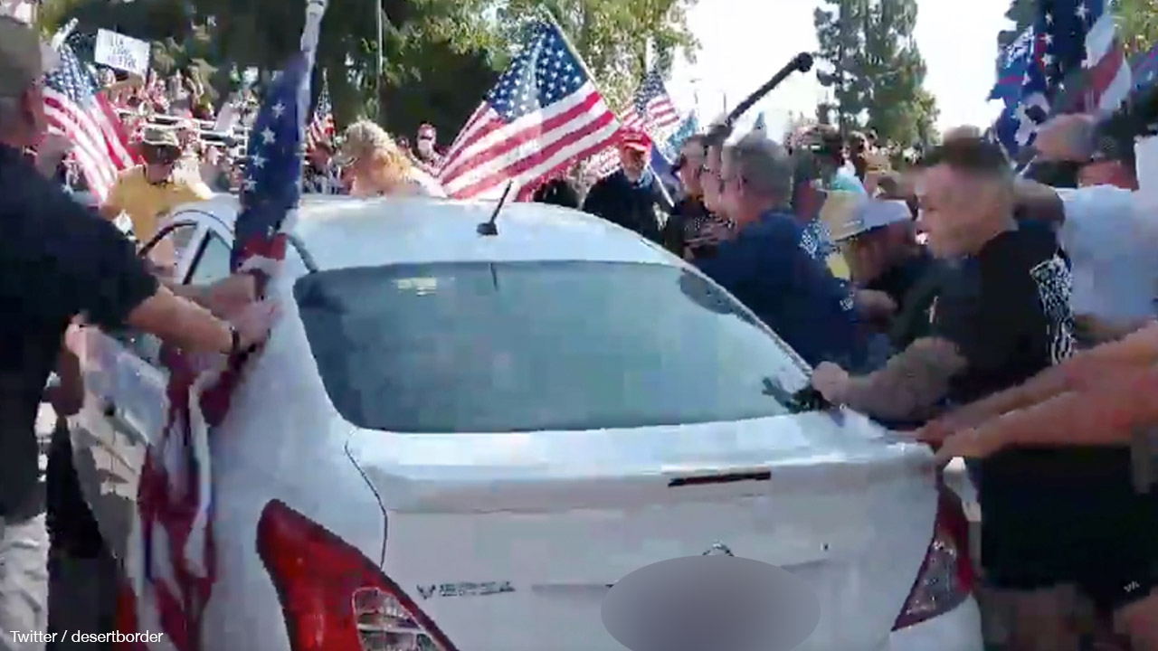 BLM organiser plows car through crowd of Trump supporters