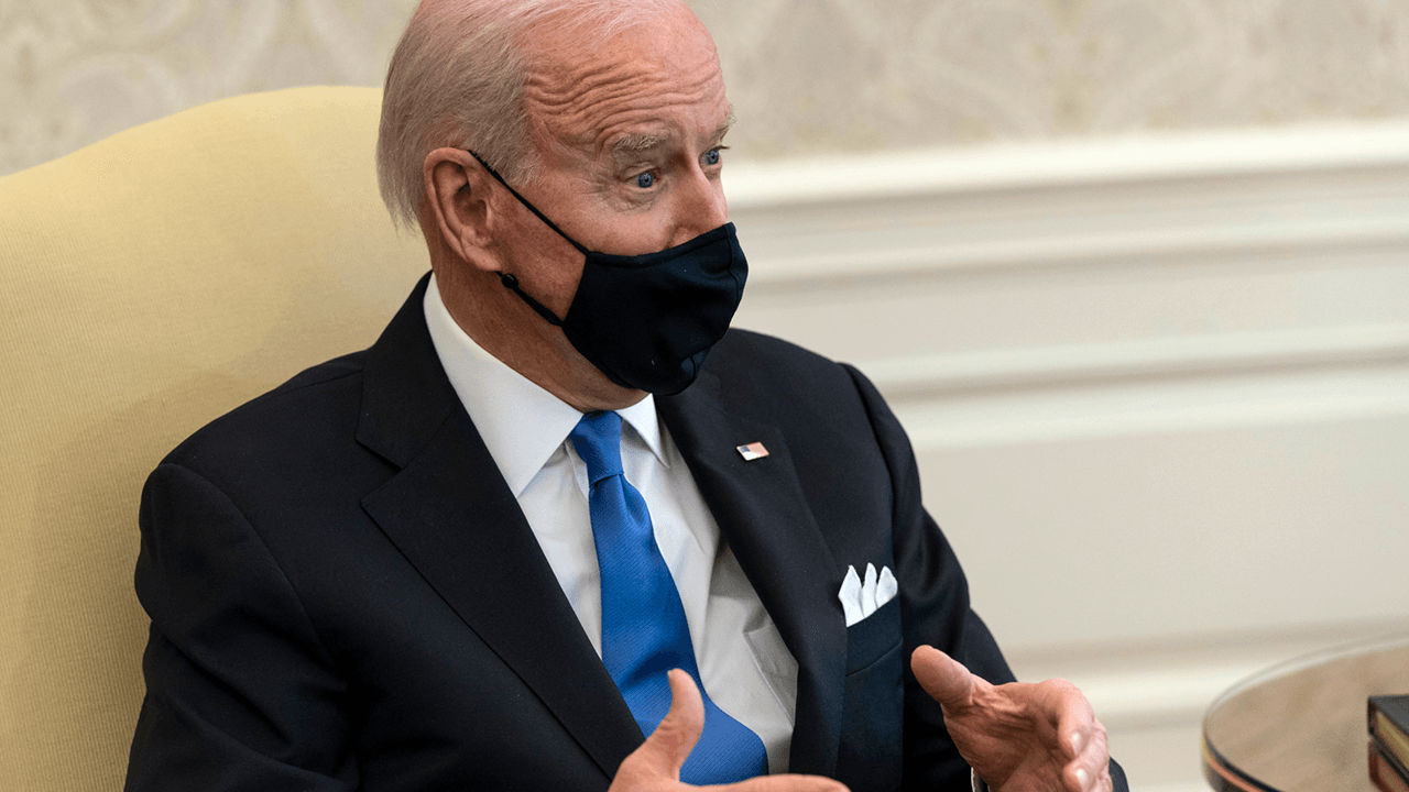 Biden signs voting rights executive order as sweeping voting reform bill awaits Senate vote