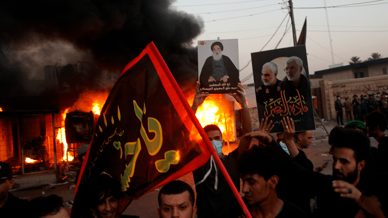 Iran-backed militia in Iraq vows to attack U.S. in “open war” in retaliation for American airstrikes
