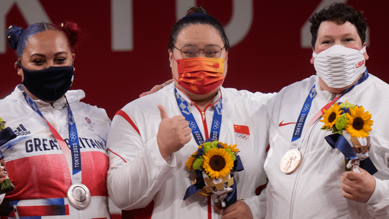 WATCH: Women’s weightlifting medallists go silent when asked about inclusion of Laurel Hubbard in Olympics