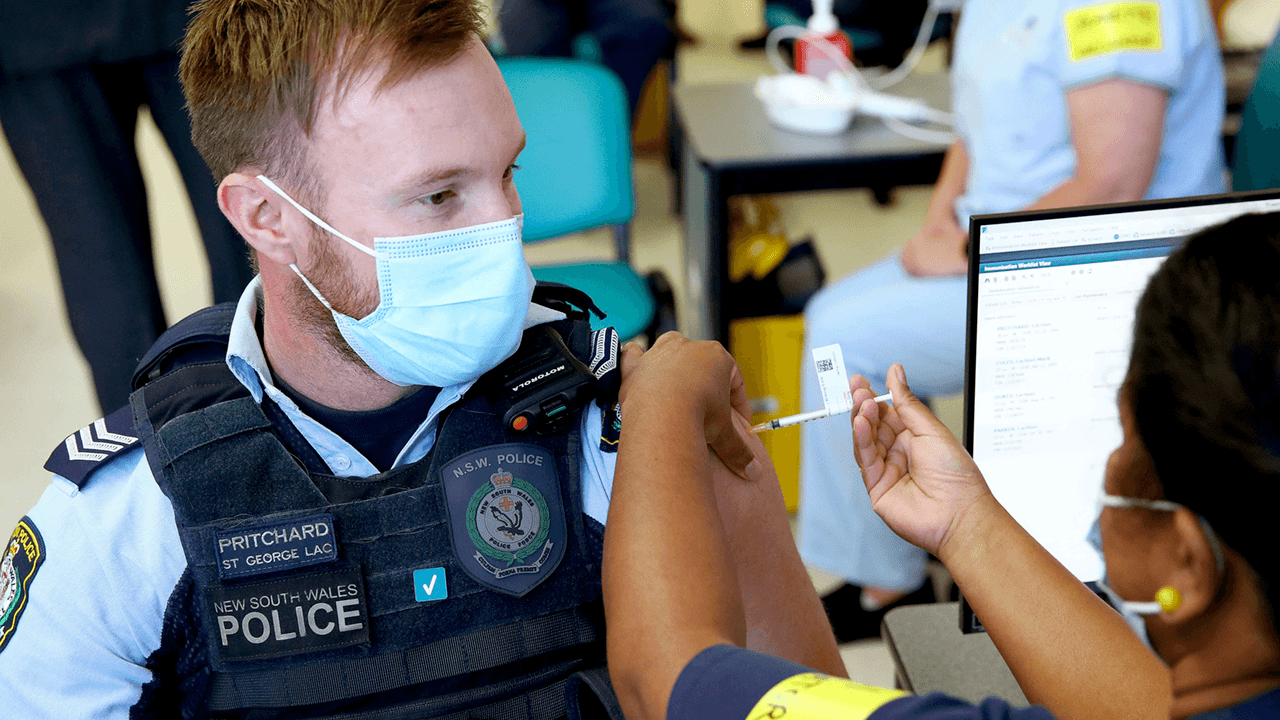 Australian customer service minister suggests that unvaccinated people trying to enter businesses could be jailed
