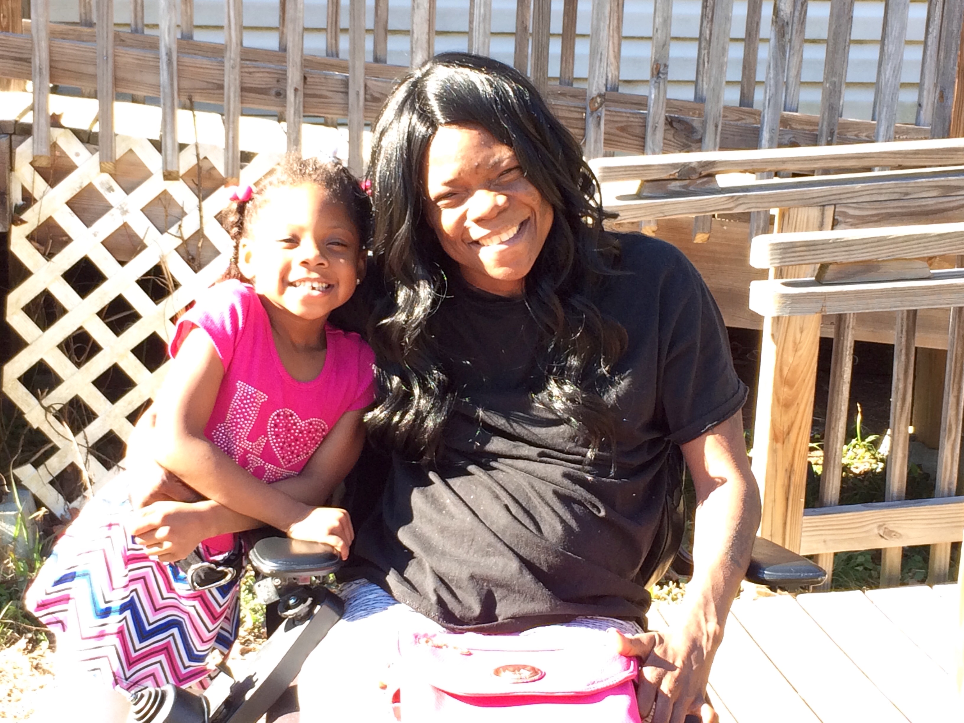 Richshanda G. and her daughter Mylon outside their home in Columbia, S.C.