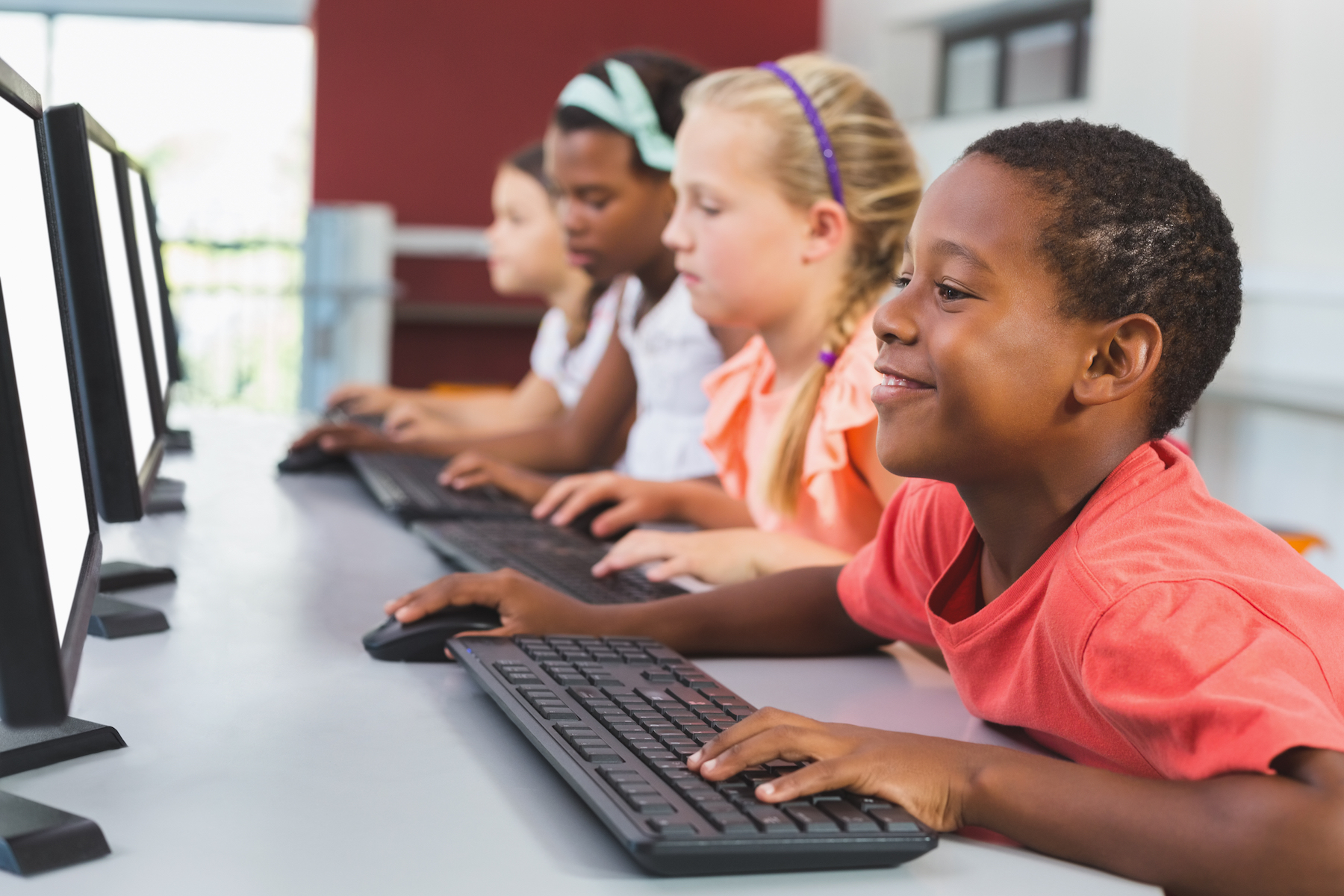 shutterstock_575481121_Students_with_Computers.jpg