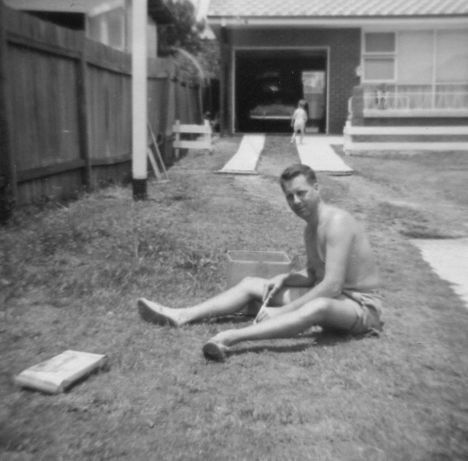 Graeme with his dad in the backyard