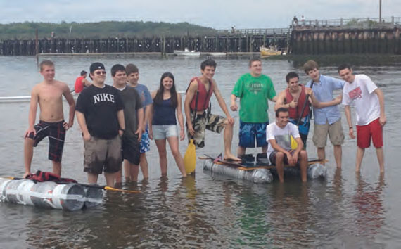 Participants in the popular Anything That Floats Race show off some of their watercraft. anything_that_floats_race.jpg